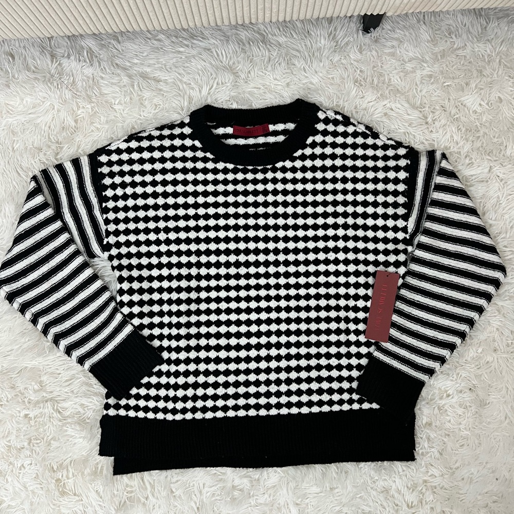 Mixed black and white stripe and checkered pullover knit sweater